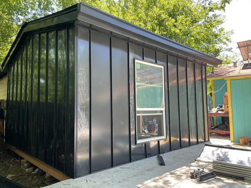 Black standing seam metal wall panels for Metal Roof Installation in Lakewood Park