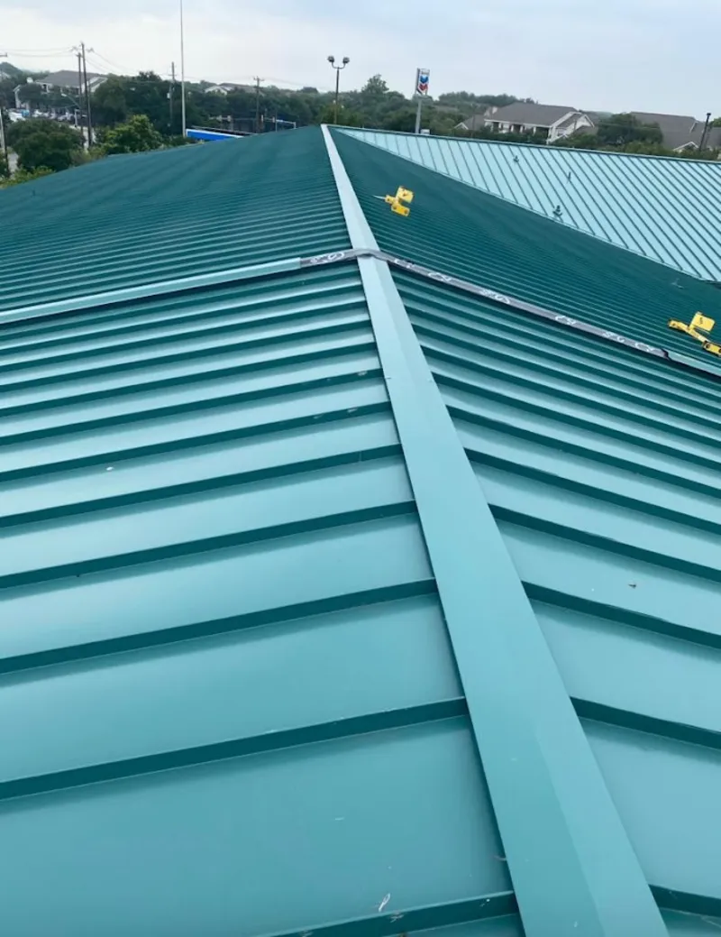Green commercial metal roof ridge and valley for Metal Roof Repair in Lakewood Park