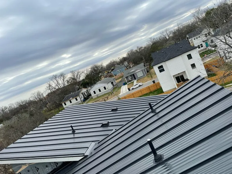 Standing seam metal roof panels with vents for Skylight Repair in Lakewood Park